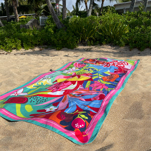 Suzanne Jennerich x Surfer Towel signature print towel lying on a  beach, north shore oahu, hawaii